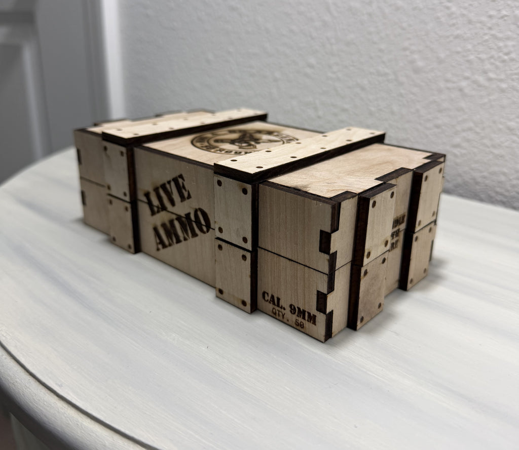 Closed handmade wooden storage crate with removable lid and engraved GG Arsenal emblem, sold empty.