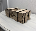 Closed handmade wooden storage crate with removable lid and engraved GG Arsenal emblem, sold empty.